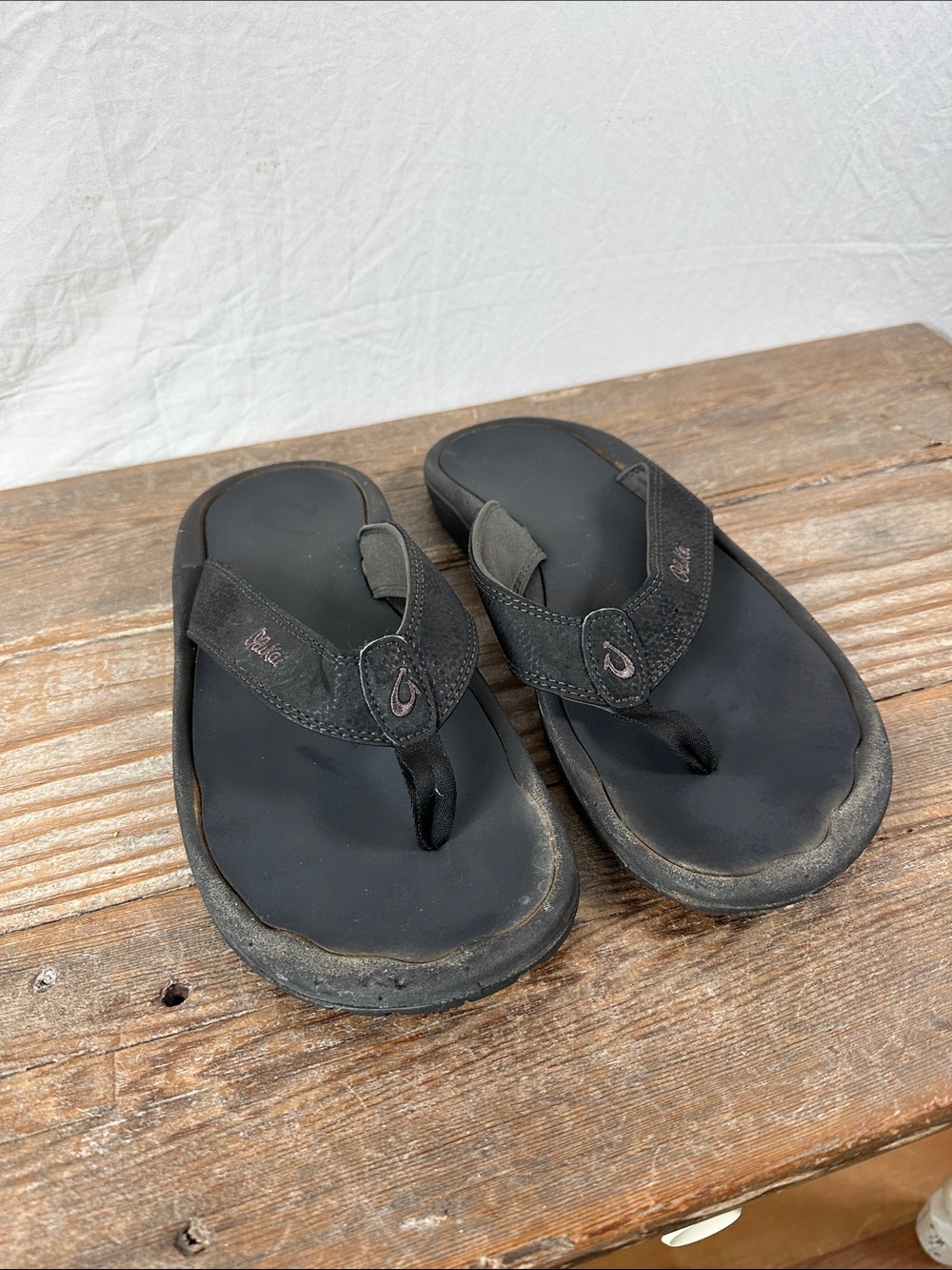 OluKai Men's Black Flip-Flop Sandals
